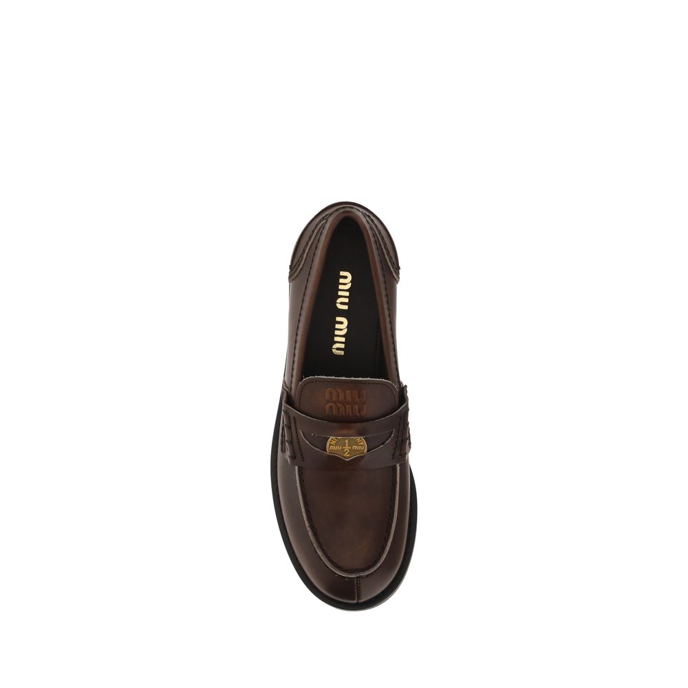 Miu Miu bos-taurus reverie-atelier slip-on loafers